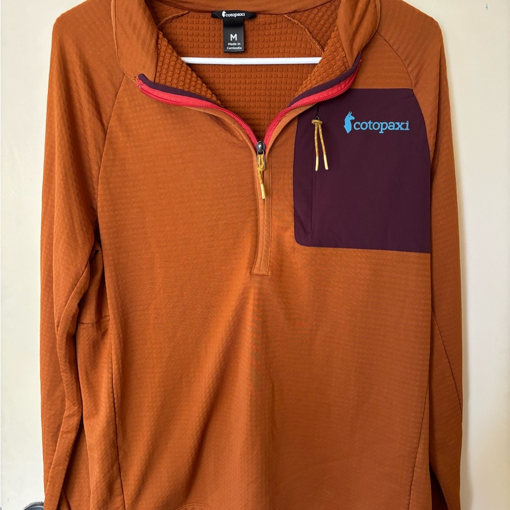 Cotopaxi Rust Pullover with Maroon Pocket